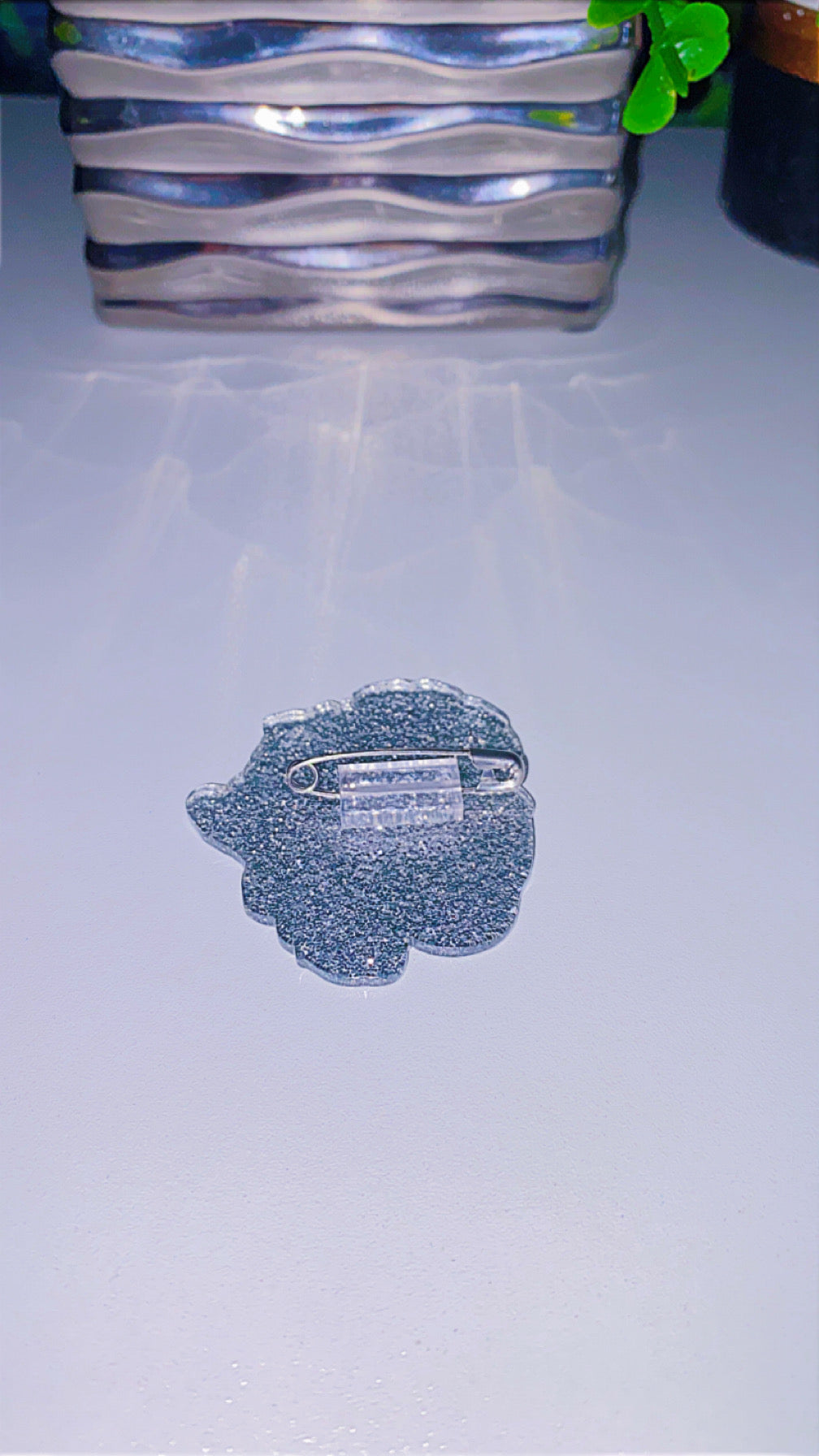 Acrylic charm with safety pin backing