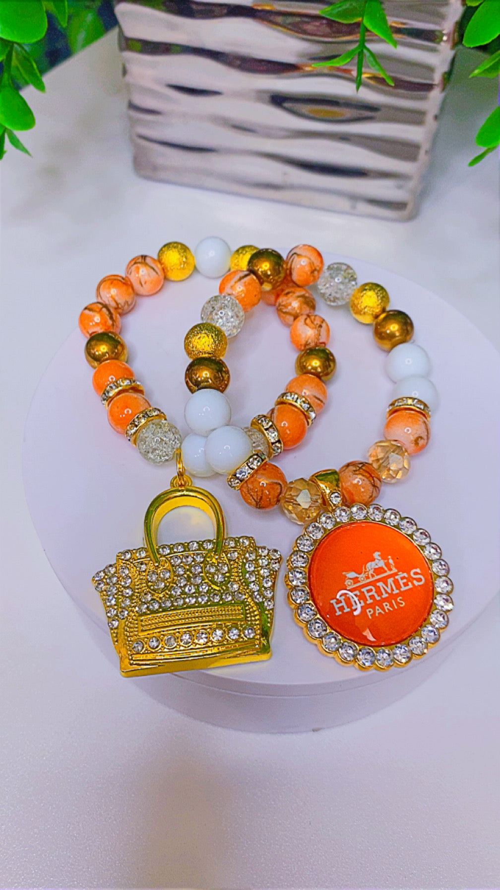 Flashy girl orange and gold charm bracelet set
