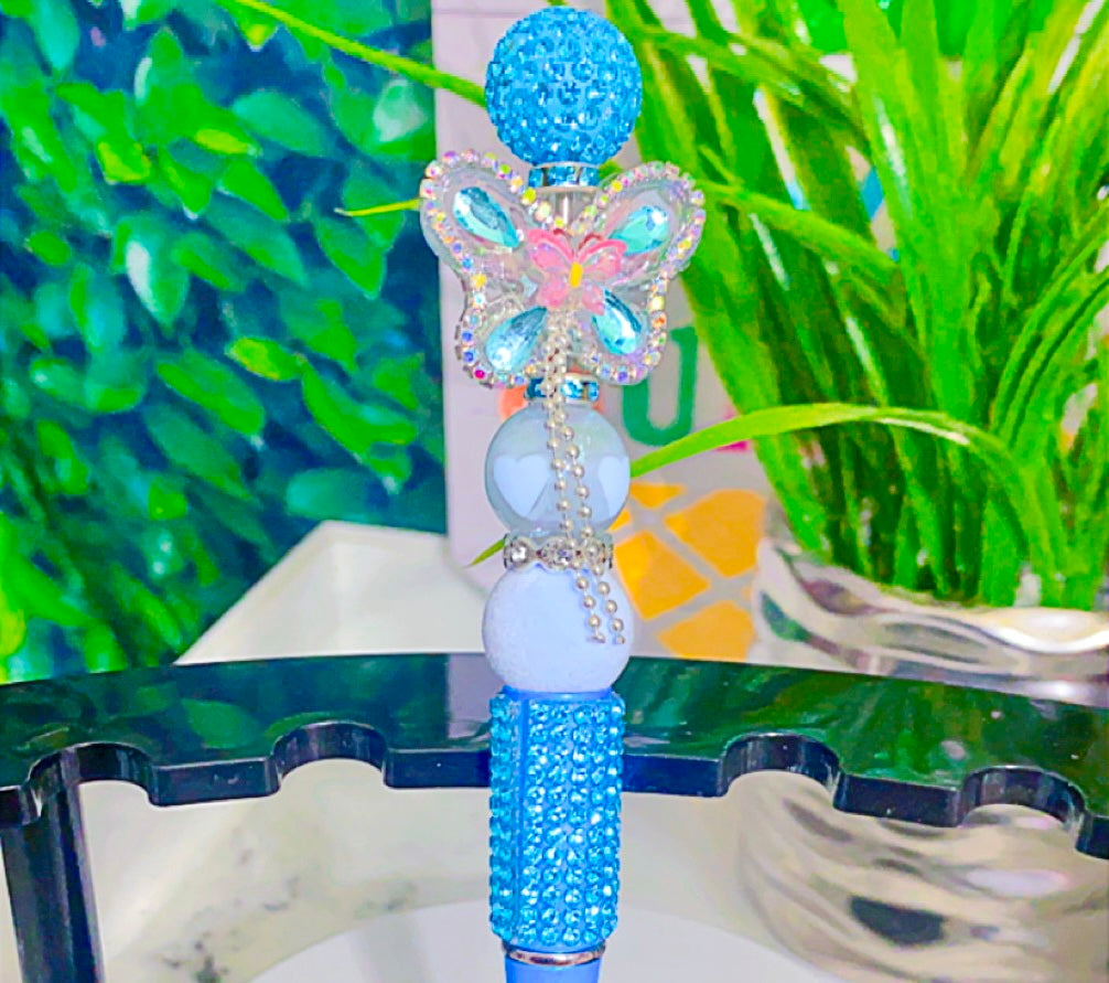 Blue butterfly ink pen