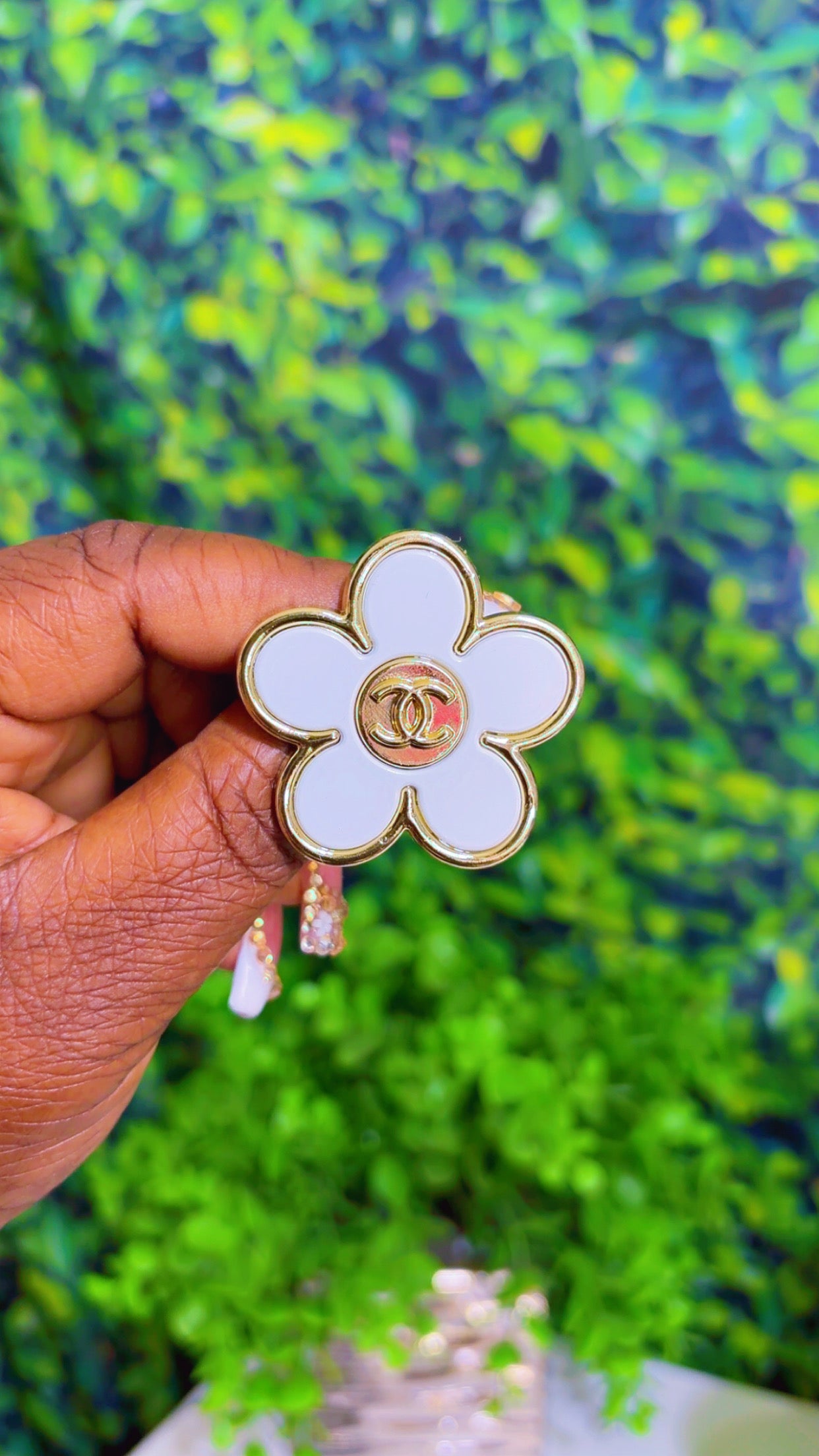 Gold and white flower brooch