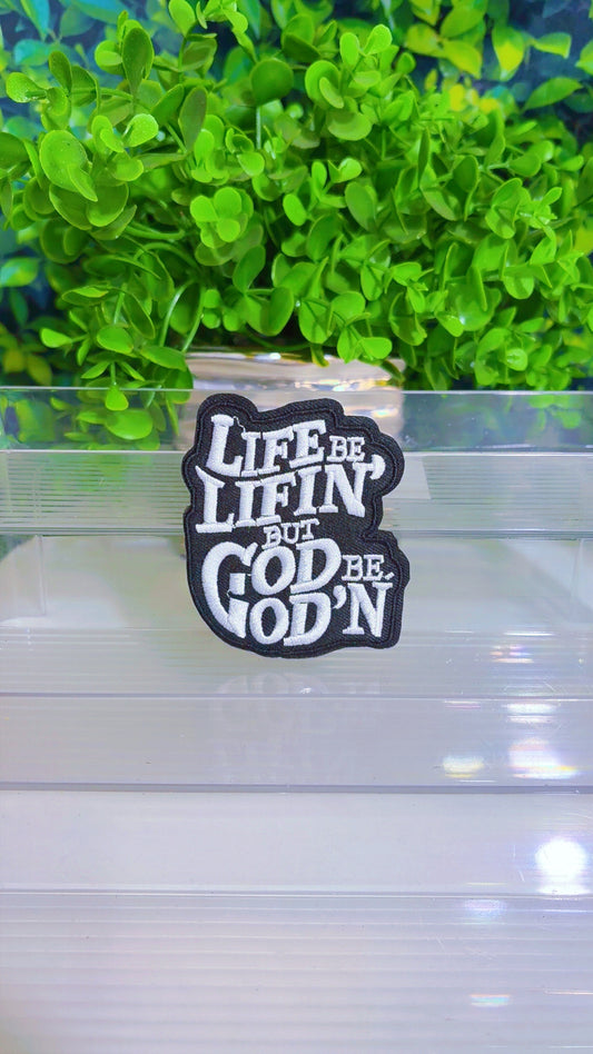 Life be lifin but God be God’n iron on patch