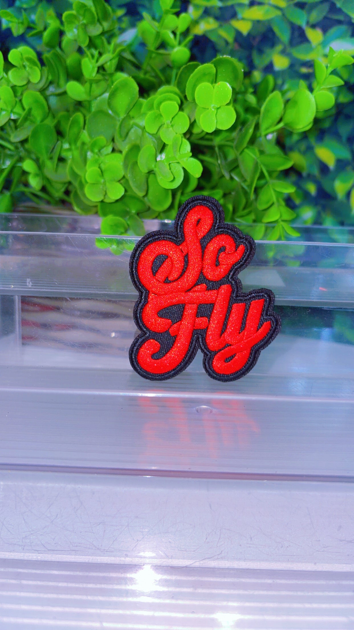 Red So fly iron on patch