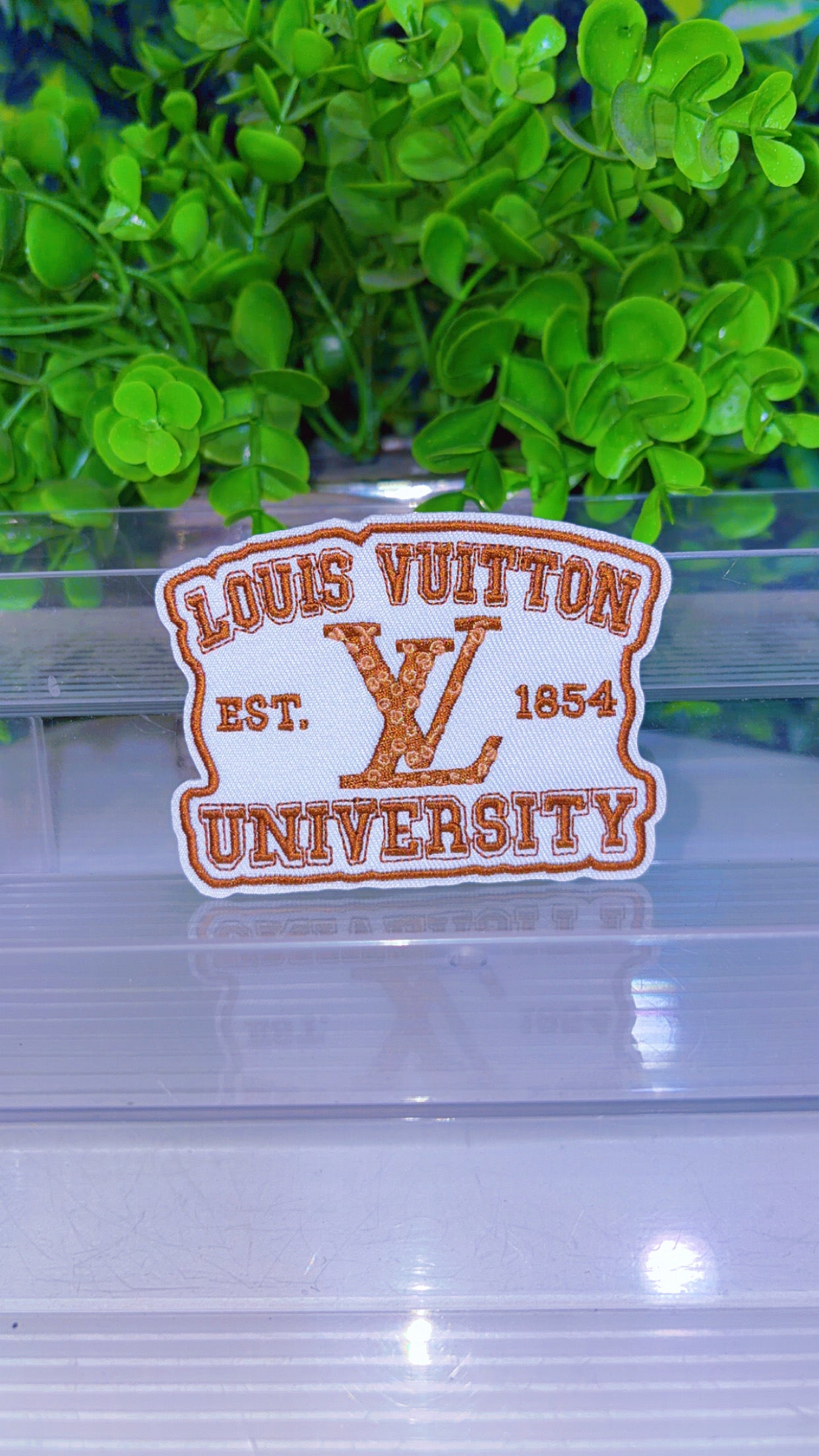 Brown and white iron on patch