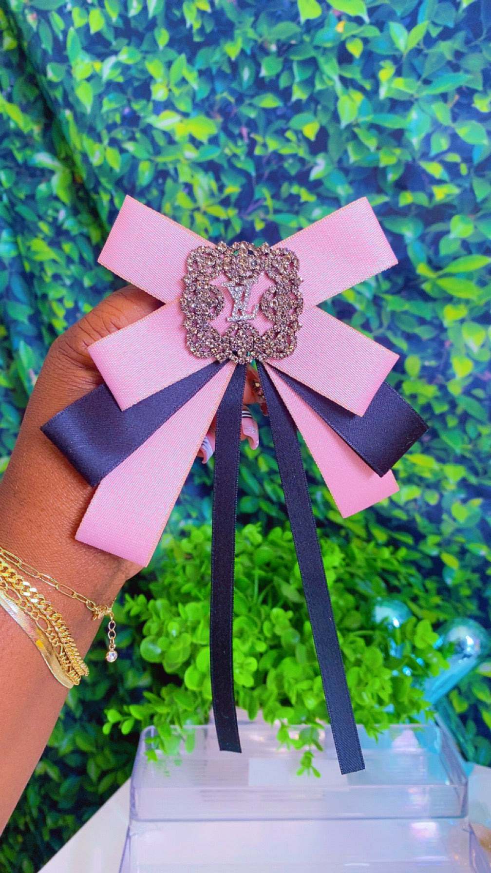 Light pink and black bow brooch