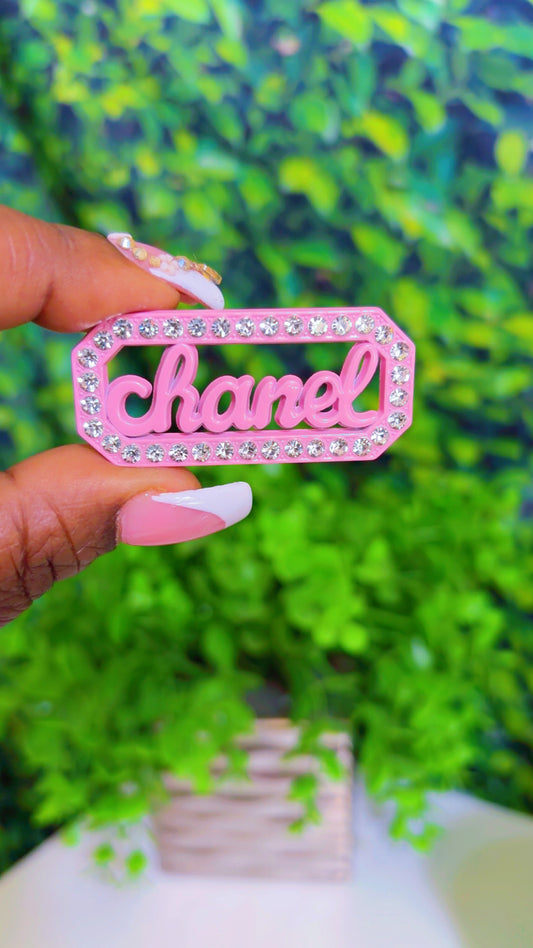 Light pink metal charm with rhinestones