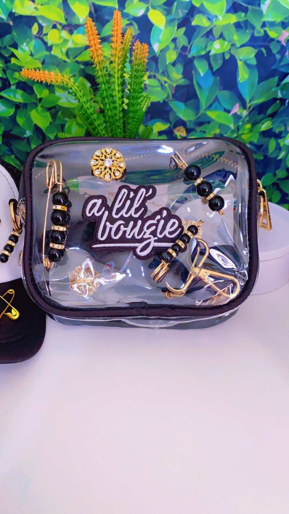 A Bouji trucker hat and purse set (strap for purse included)