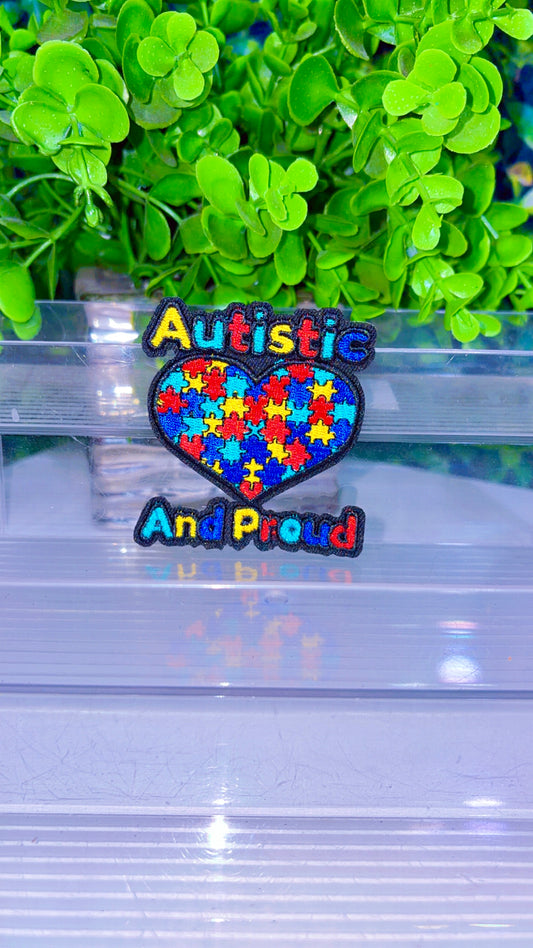 Autistic and proud iron on patch