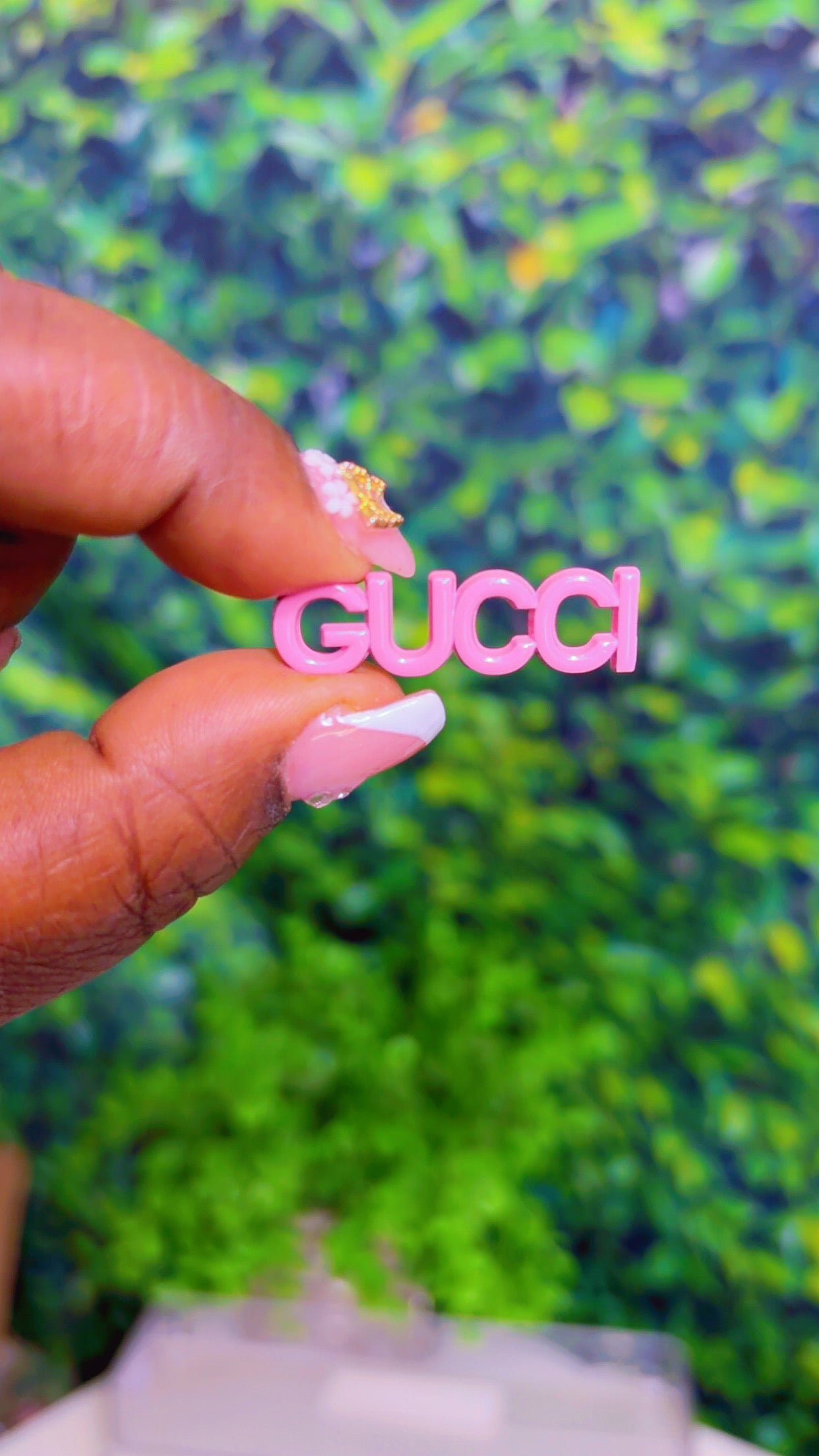 Pink metal charm