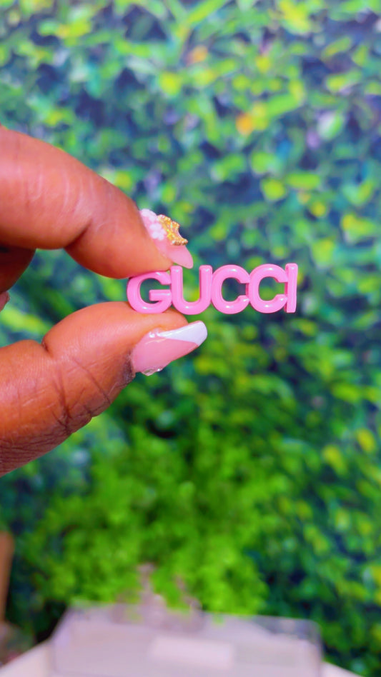 Pink metal charm